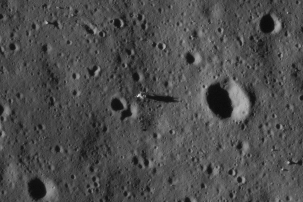 This image, taken by the Indian Space Research Organization's (ISRO) Chandrayaan2 Orbiter and provided by Marty McGuire, shows the Apollo 11 landing site with the lunar descent stage visible on the moon on April 2, 2021. (ISRO image processed by Marty McGuire/BackyardAstronomyGuy.com via AP)