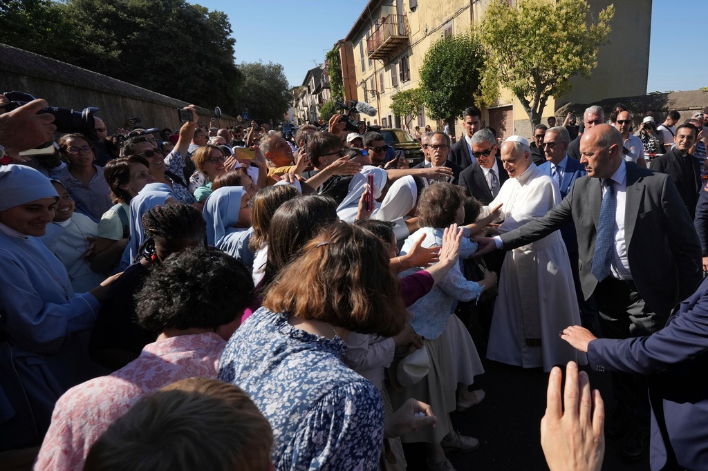 FILE - Pope Leo XIV arrives at the papal summer residence in Castel Gandolfo, south of Rome, for a six-week vacation, Sunday, July 6, 2025. (AP Photo/Andrew Medichini, File)