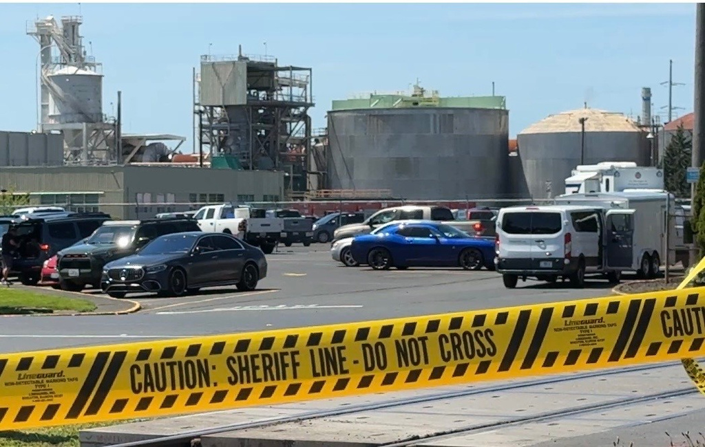 FILE - Yellow police tape is seen on May 27, 2026 outside the Longview, Wash. paper mill where a deadly chemical tank failure occurred. (AP Photo/Claire Rush, File)