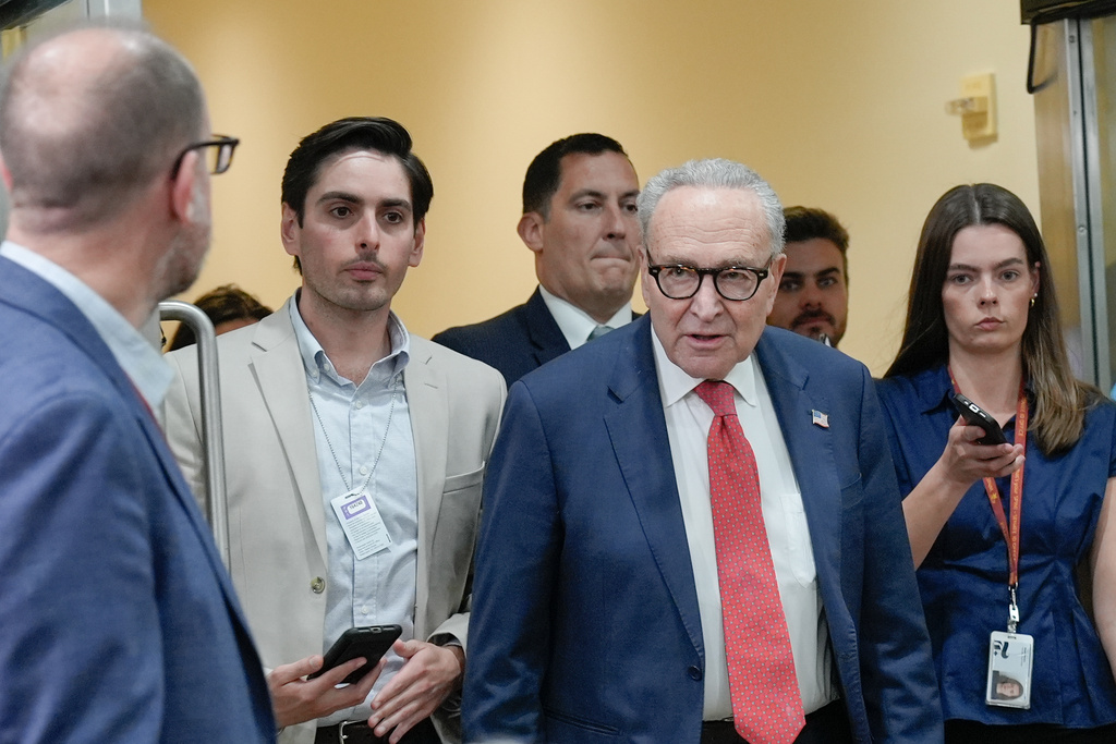 Sen. Minority Leader Chuck Schumer of N.Y., speaks with reporters at the Capitol Subway on day 36th of the government shutdown, Wednesday, Nov. 5, 2025, in Washington. (AP Photo/Mariam Zuhaib)