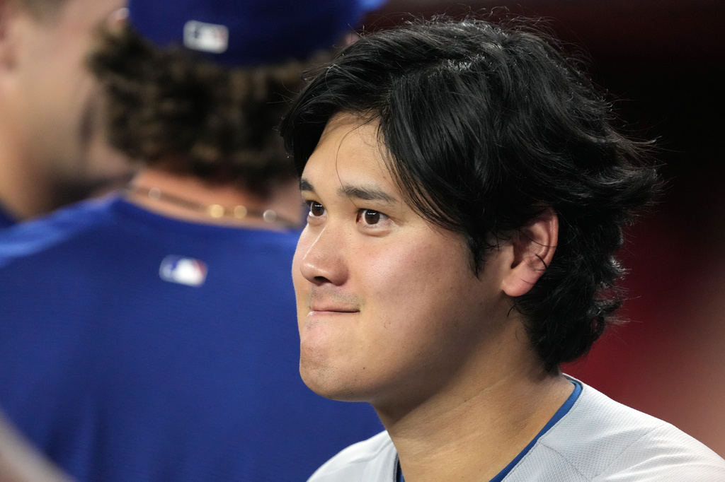 Los Angeles Dodgers two-way player Shohei Ohtani (17) against the Arizona Diamondbacks in the first inning of a baseball game, Friday, Aug 7, 2026, in Phoenix. (AP Photo/Rick Scuteri)