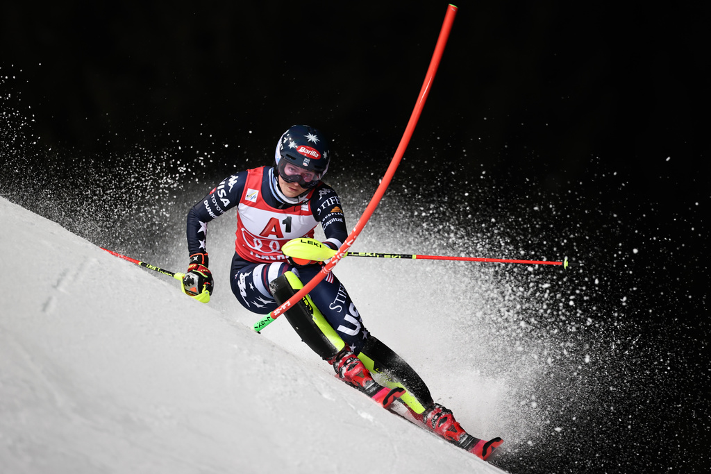 United States' Mikaela Shiffrin speeds down the course during an alpine ski, women¥s World Cup slalom, in Flachau, Austria, Tuesday, Jan. 13, 2026. (AP Photo/Marco Trovati)