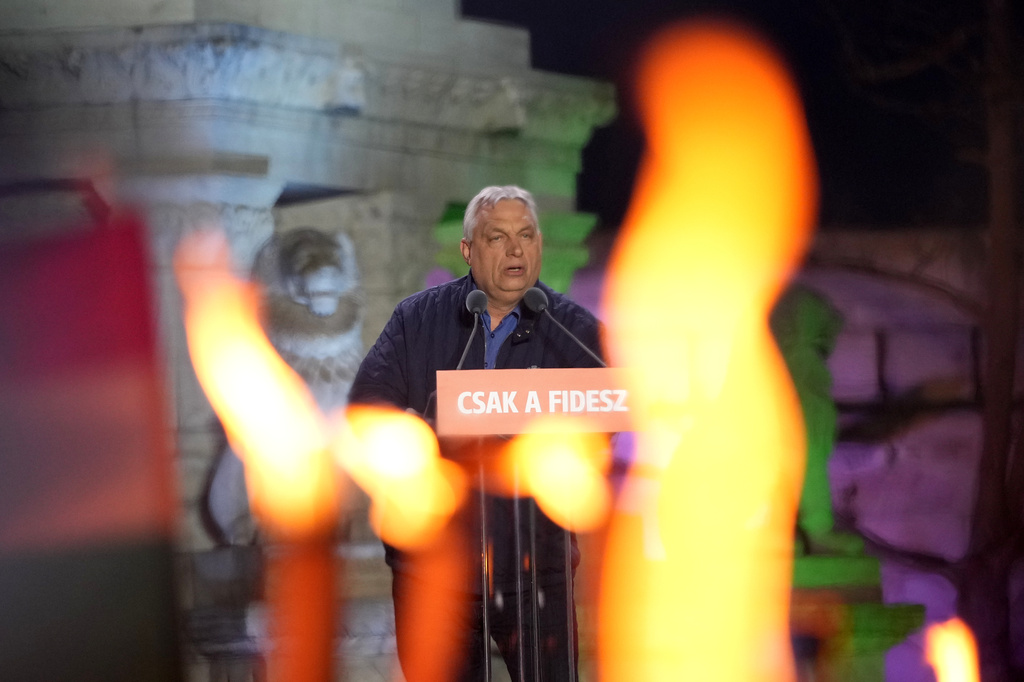 Hungary's Prime Minister Viktor Orban addresses supporters during the electoral campaign closing rally of the governing Fidesz in Budapest, Hungary, Saturday, April 11, 2026. (AP Photo/Petr David Josek)