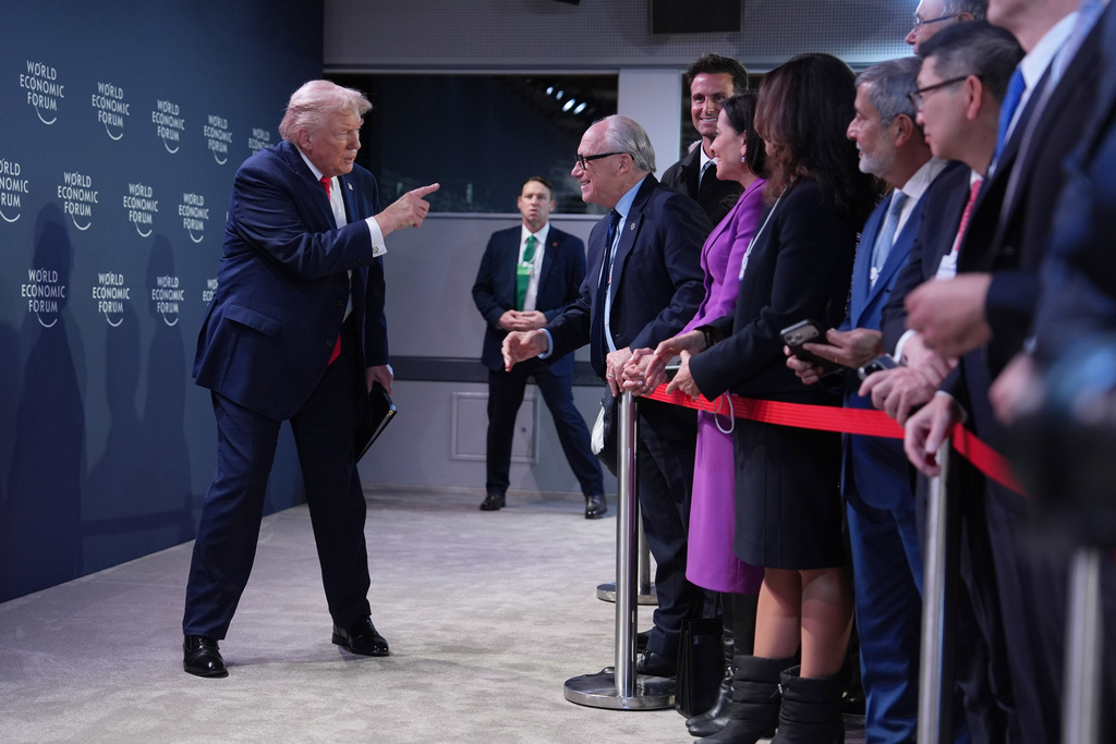 President Donald Trump arrives to address a meeting of Global Business Leaders at the Annual Meeting of the World Economic Forum in Davos, Switzerland, Wednesday, Jan. 21, 2026. (AP Photo/Evan Vucci)