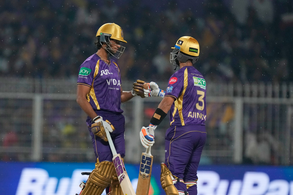 Kolkata Knight Riders' captain Ajinkya Rahane, right, and Akash Deep bump fists during the Indian Premier League cricket match between Kolkata Knight Riders and Punjab Kings in Kolkata , India, Monday, April 6, 2026. (AP Photo/Bikas Das)