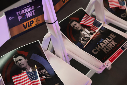 Signs with a photo of Charlie Kirk are seen before Vice President JD Vance speaks at a Turning Point USA event at the Pavilion at Ole Miss at the University of Mississippi in Oxford, Miss., Wednesday, Oct. 29, 2025. (Jonathan Ernst/Pool via AP) Signs with a photo of Charlie Kirk are seen before Vice President JD Vance speaks at a Turning Point USA event at the Pavilion at Ole Miss at the University of Mississippi in Oxford, Miss., Wednesday, Oct. 29, 2025. (Jonathan Ernst/Pool via AP)