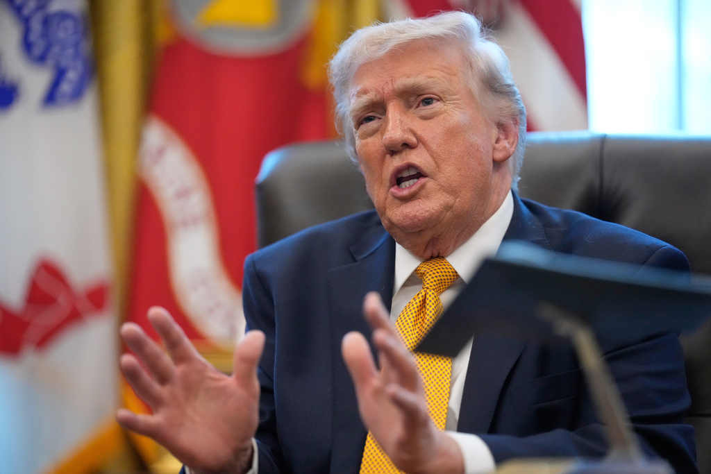 President Donald Trump speaks after signing an executive order regarding a task force on fraud in the Oval Office of the White House, Monday, March 16, 2026, in Washington. (AP Photo/Julia Demaree Nikhinson)