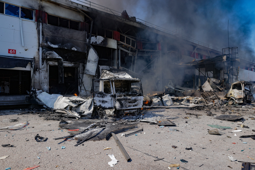 A Nova Poshta postal warehouse is destroyed following Russian air attack on the outskirts of Kharkiv, Ukraine, Sunday, Aug. 2, 2026. (AP Photo/Yevhen Titov)