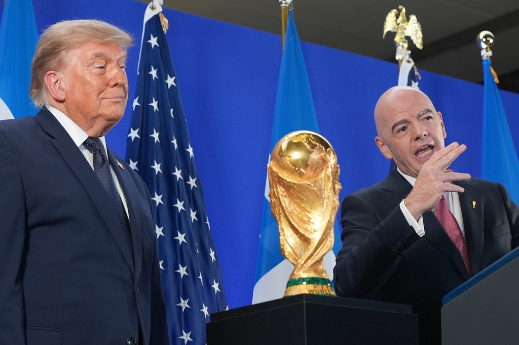 President Donald Trump listens as FIFA President Gianni Infantino speaks at a reception at Trump Tower in New York, Friday, July 17, 2026. (AP Photo/Jacquelyn Martin)