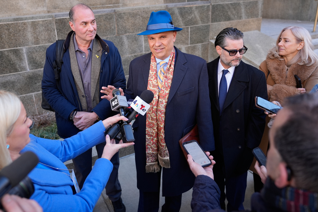 Arthur Aidala, an attorney for Harvey Weinstein, center, talks to reporters outside the courthouse in New York, Thursday, Jan. 8, 2026. (AP Photo/Seth Wenig)