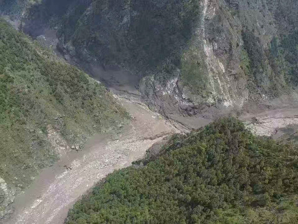 This photo released by Xinhua News Agency, shows a mudslide-hit area near Gyirong Port in southwestern China's Tibetan Autonomous Region on Wednesday, Aug. 26, 2026. (Xinhua via AP)