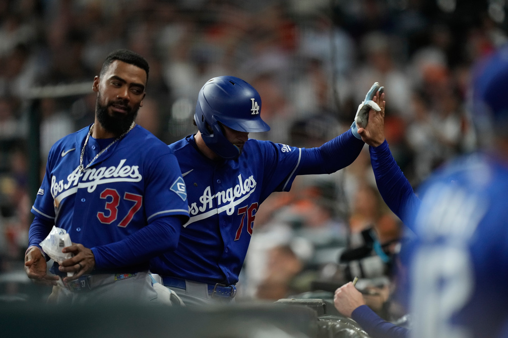 Los Angeles Dodgers' Alex Freeland (76) returns to the dugout after hitting a home run during the second inning of a baseball game against the Houston Astros in Houston, Monday, May 4, 2026. (AP Photo/Ashley Landis)