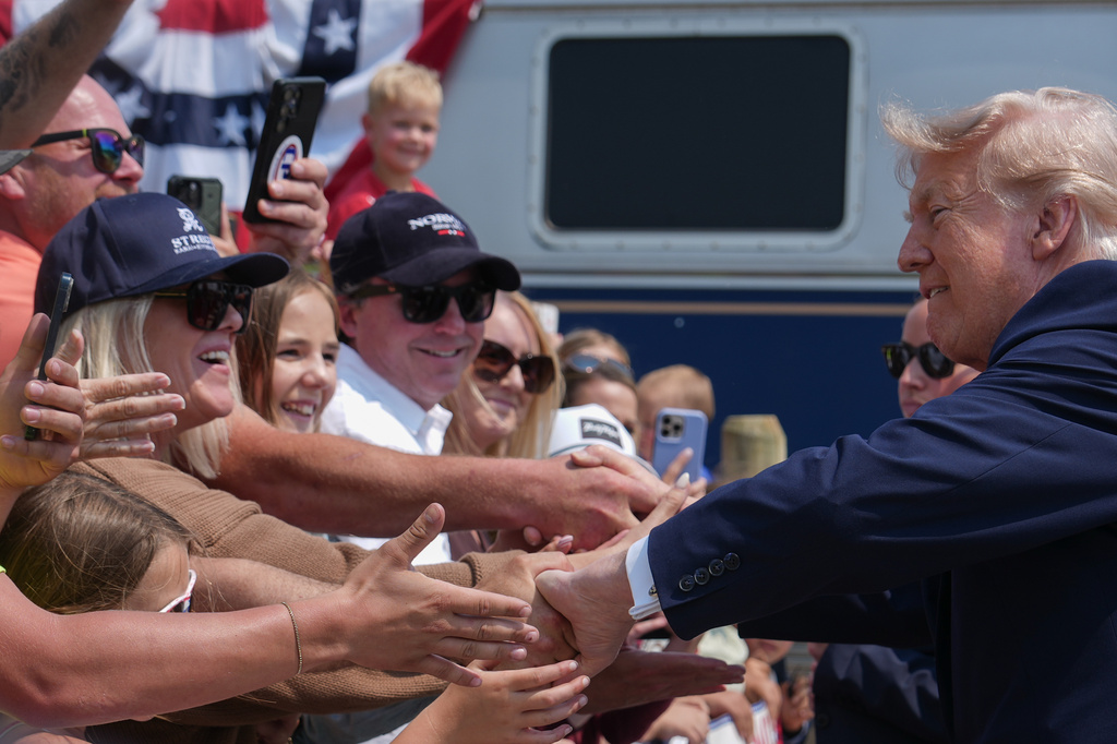 President Donald Trump greets supporters after arriving on a Freedom 250 train, Wednesday, July 1, 2026, in Medora, N.D. (AP Photo/Julia Demaree Nikhinson)
