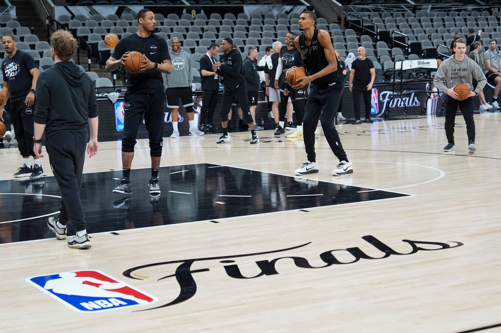 San Antonio Spurs forward Victor Wembanyama shoots free throws during a workout prior to the start of the NBA Finals basketball series against the New York Knicks, Tuesday, June 2, 2026, in San Antonio. (AP Photo/Eric Gay)
