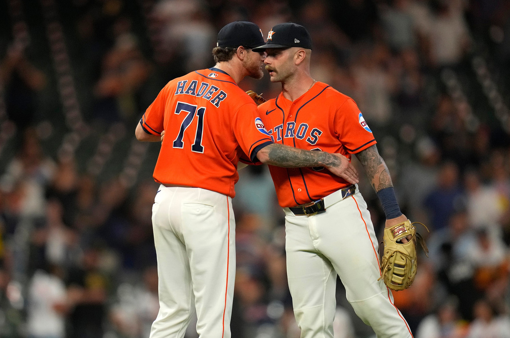 Houston Astros closer Josh Hader, left, celebrates the Astros' come-from-behind win with Christian Walker after a baseball game against the Pittsburgh Pirates, Wednesday, June 3, 2026, in Houston. (AP Photo/Karen Warren)
