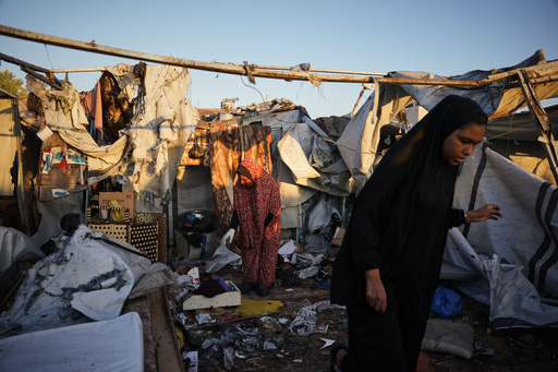 Displaced Palestinians inspect the damage after an Israeli army strike on their tent camp in Deir al-Balah, Gaza Strip, Wednesday, Oct. 29, 2025. (AP Photo/Abdel Kareem Hana) Displaced Palestinians inspect the damage after an Israeli army strike on their tent camp in Deir al-Balah, Gaza Strip, Wednesday, Oct. 29, 2025. (AP Photo/Abdel Kareem Hana)