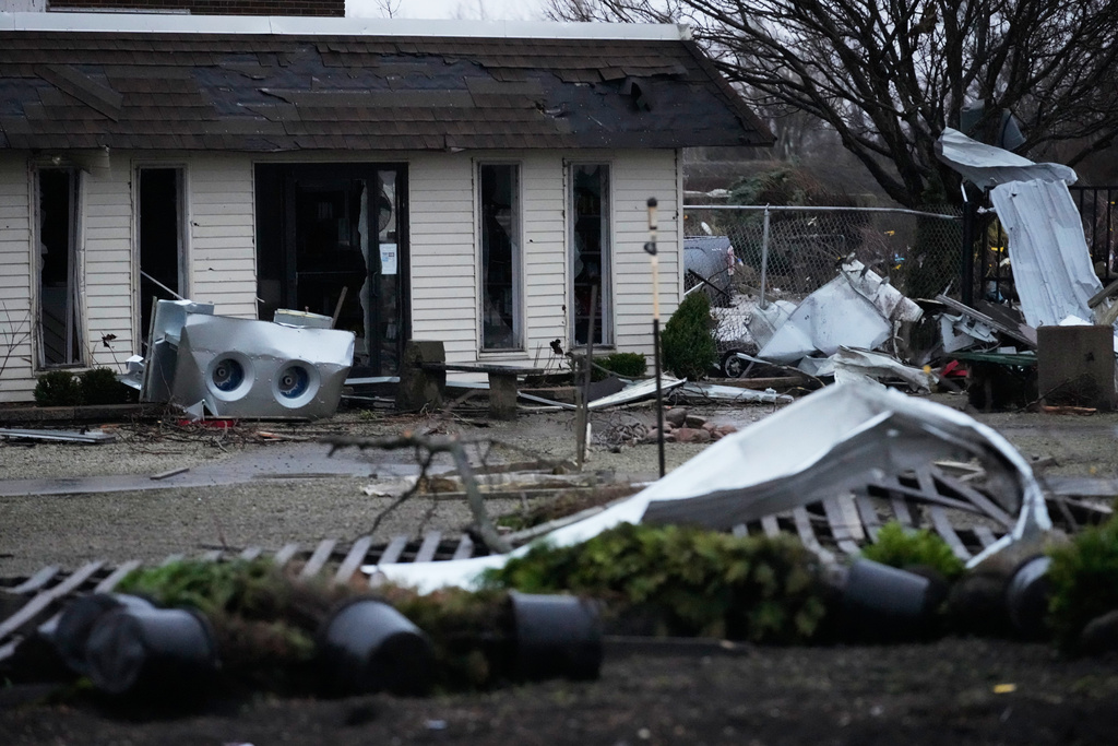 A storm-damaged Tholens' Landscape & Garden center is seen in the aftermath of a powerful storm that ripped through the area a day earlier in Kankakee, Ill., Wednesday, March 11, 2026. (AP Photo/Nam Y. Huh)