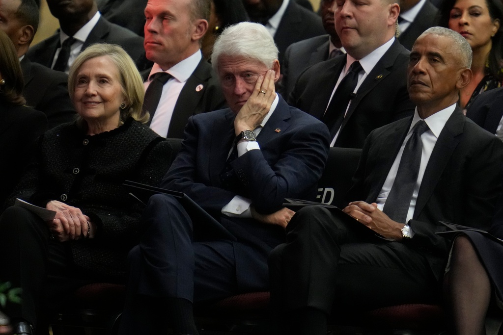 Former Secretary of State Hillary Clinton, former President Bill Clinton and former President Barack Obama attend the Public Homegoing Service for Reverend Jesse Jackson at the House of Hope in Chicago, Friday, March 6, 2026. (AP Photo/Erin Hooley)