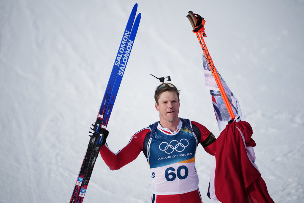 Vetle Sjaastad Christiansen, of Norway, reacts in the finish area of the men's 10-kilometer sprint biathlon race at the 2026 Winter Olympics in Anterselva, Italy, Friday, Feb. 13, 2026. (AP Photo/Andrew Medichini)
