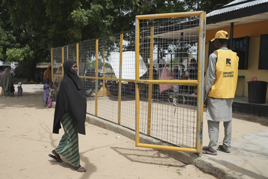Falmata Muhammed, who once lost her pregnancy, arrives for a checkup at a facility run by aid group International Rescue Committee, in Magumeri, in northeast Nigeria's Borno state, Tuesday, July 22, 2025. (AP Photo/Sunday Alamba)