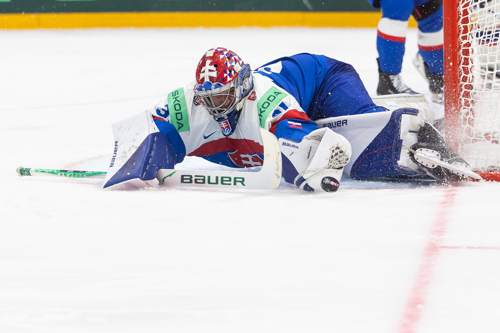 Slovakia's goaltender Samuel Hlavaj in action during the 2026 IIHF Men's Ice Hockey World Championship preliminary round group B game between Slovakia and Norway, in Fribourg, Switzerland, Saturday, May 16, 2026. (Cyril Zingaro/Keystone via AP)