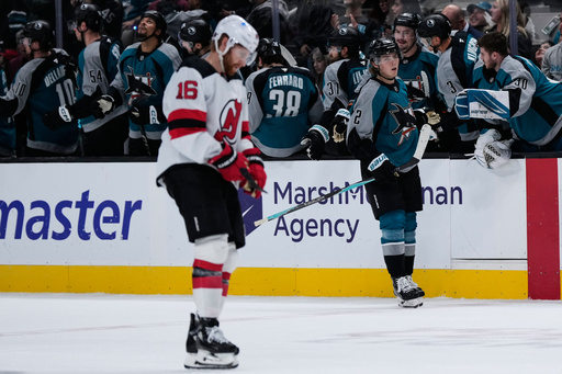 San Jose Sharks center Will Smith (2) celebrates with teammates after scoring a goal during the second period of an NHL hockey game against the New Jersey Devils, Thursday, Oct. 30, 2025, in San Jose, Calif. (AP Photo/Godofredo A. Vásquez) San Jose Sharks center Will Smith (2) celebrates with teammates after scoring a goal during the second period of an NHL hockey game against the New Jersey Devils, Thursday, Oct. 30, 2025, in San Jose, Calif. (AP Photo/Godofredo A. Vásquez)