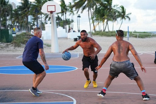 Ozzie McRae, center, plays basketball at Fort Lauderdale Beach Park, the site of proposed pickleball courts as part of a new luxury development, Oct. 8, 2025, in Fort Lauderdale, Fla. (AP Photo/Lynne Sladky) Ozzie McRae, center, plays basketball at Fort Lauderdale Beach Park, the site of proposed pickleball courts as part of a new luxury development, Oct. 8, 2025, in Fort Lauderdale, Fla. (AP Photo/Lynne Sladky)