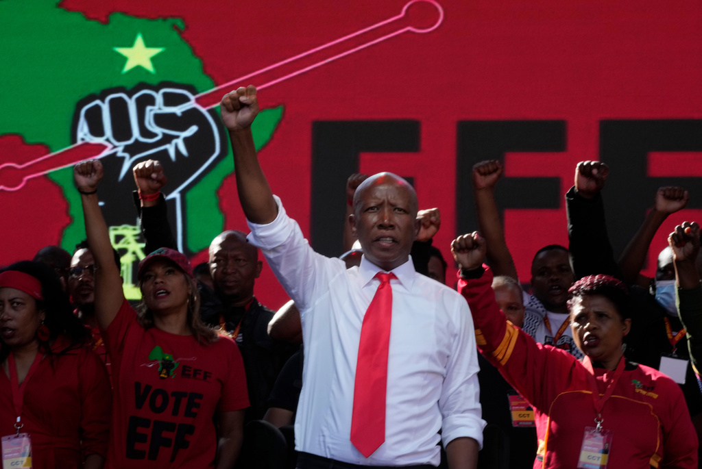 FILE - Economic Freedom Fighters party leader Julius Malema raises his fist at an election rally in Polokwane, South Africa, on May 25, 2024. (AP Photo/Themba Hadebe, File)