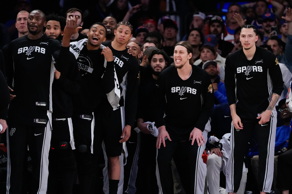 The San Antonio Spurs bench watches during second half of Game 3 of the NBA Finals basketball series against the New York Knicks, Monday, June 8, 2026, in New York. (AP Photo/Ross D. Franklin)