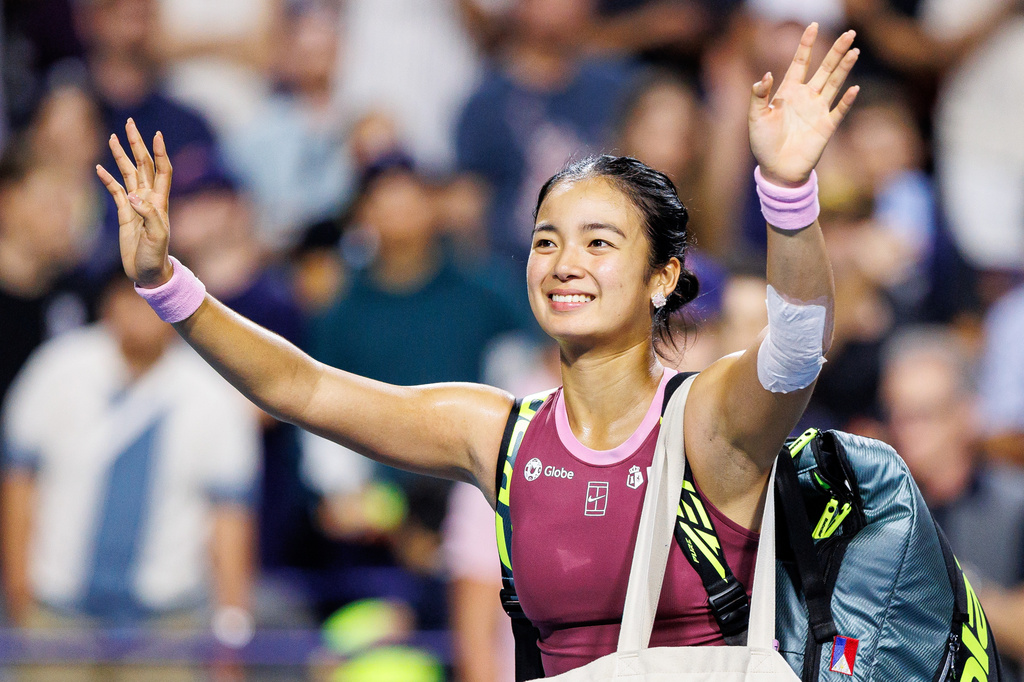 Alexandra Eala, of the Philippines, waves to the crowd after losing to Belinda Bencic, of Switzerland, in a round of 16 match at the National Bank Open tennis tournament in Toronto, on Sunday, Aug. 9, 2026. (Keito Newman/The Canadian Press via AP)
