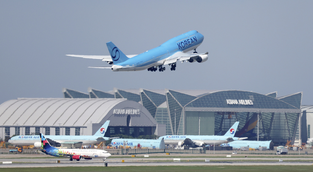 A Korean Air chartered plane takes off to bring back Korean workers detained in an immigration raid in Georgia, at Incheon International Airport, South Korea, Wednesday, Sept. 10, 2025. (Yonhap via AP)