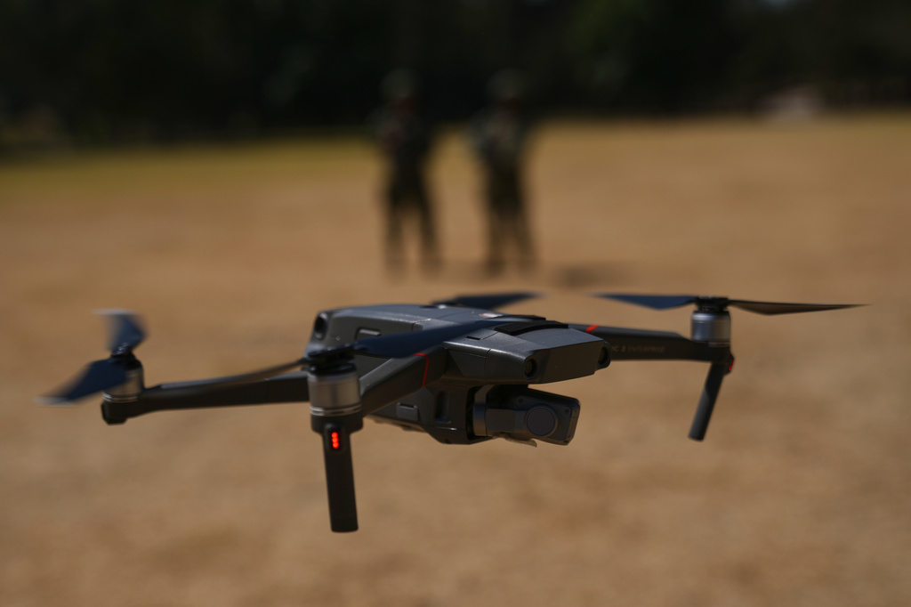 FILE - Soldiers from the Mexican Army's anti-drone squadron display equipment and tactics to be used during the 2026 FIFA World Cup, during a media presentation in Mexico City, Feb. 27, 2026. (AP Photo/Marco Ugarte, File)