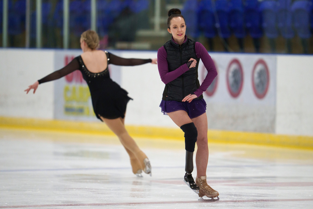 Stef Reid, a former Paralympic athlete who now does figure skating, warmes up before competing in the British Adult Figure Skating Championships in Sheffield, England, Friday, Feb. 6, 2026. (AP Photo/Jon Super)