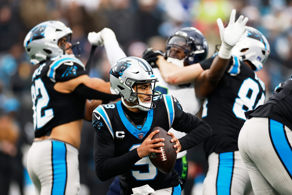 Carolina Panthers quarterback Bryce Young passes against the Seattle Seahawks during the second half of an NFL football game, Sunday, Dec. 28, 2025, in Charlotte, N.C. (AP Photo/Rusty Jones)