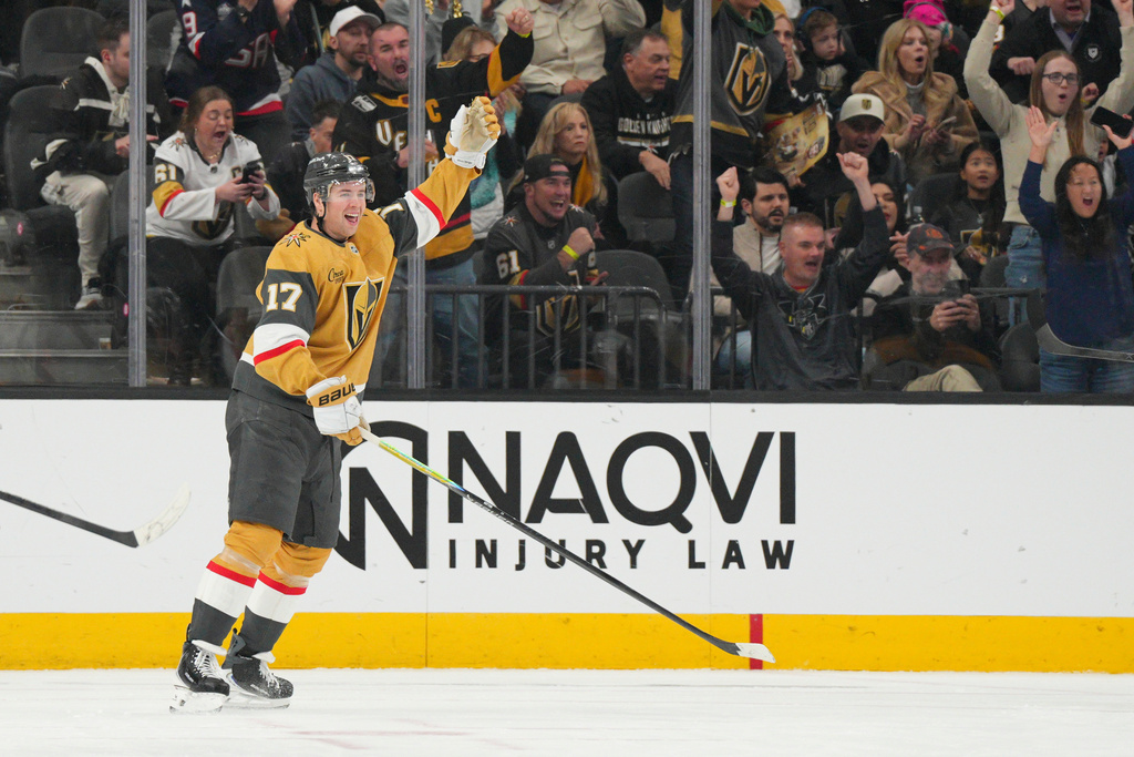Vegas Golden Knights defenseman Ben Hutton celebrates his goal against the Nashville Predators during the first period of an NHL hockey game, Wednesday, Dec. 31, 2025, in Las Vegas. (AP Photo/Candice Ward)