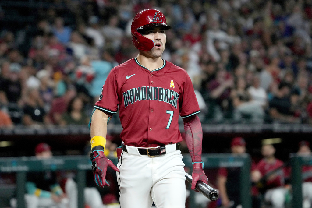 FILE - Arizona Diamondbacks' Corbin Carroll (7) reacts during the first inning of a baseball game against the Boston Red Sox, Sunday, Sept 7, 2025, in Phoenix. (AP Photo/Rick Scuteri, File)