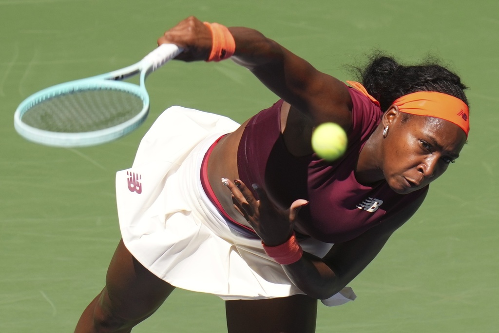 Coco Gauff, of the United States, serves against Magdalena Frech, of Poland, during the third round of the U.S. Open tennis championships, Saturday, Aug. 30, 2025, in New York. (AP Photo/Kirsty Wigglesworth)