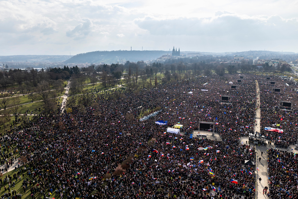 People gather to take part in a large anti-government protest in Prague, Czech Republic, Saturday, March 21, 2026. (AP Photo/Michal Turek)
