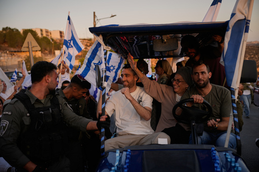 Freed hostage, Avinatan Or, center, who was recently released from Hamas captivity in Gaza, is welcomed as he return from the hospital to his home in the West Bank Jewish settlement of Shilo, Tuesday, Oct. 21, 2025. (AP Photo/Ohad Zwigenberg) Freed hostage, Avinatan Or, center, who was recently released from Hamas captivity in Gaza, is welcomed as he return from the hospital to his home in the West Bank Jewish settlement of Shilo, Tuesday, Oct. 21, 2025. (AP Photo/Ohad Zwigenberg)