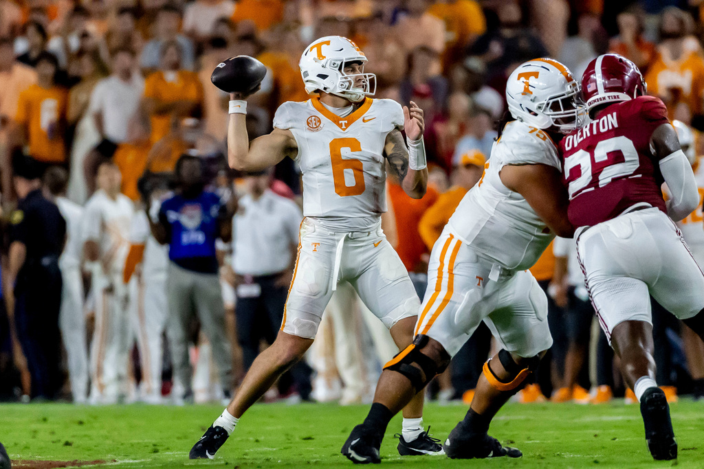 Tennessee quarterback Joey Aguilar (6) throws the ball against Alabama during the first half of an NCAA college football game Saturday, Oct. 18, 2025, in Tuscaloosa, Ala. (AP Photo/Vasha Hunt)