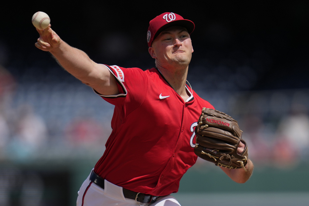 Washington Nationals starting pitcher Brad Lord throws to the Tampa Bay Rays during the first inning of a baseball game at Nationals Park, Sunday, Aug. 31, 2025, in Washington. (AP Photo/Jess Rapfogel)