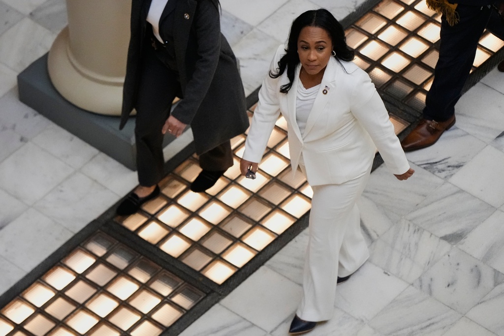 Fulton County District Attorney Fani Willis leaves the Georgia State Capitol after questioning from a Georgia State Senate panel about her prosecution of President Donald Trump on Wednesday, Dec. 17, 2025, in Atlanta. (AP Photo/Brynn Anderson)