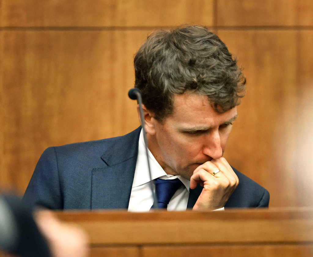 Patrick Clancy reacts as images of himself and his children on vacation a month before they were killed is shown in the courtroom at Plymouth Superior Court in Plymouth, Mass., Monday, July 27, 2026. (Greg Derr/The Patriot Ledger via AP, Pool)