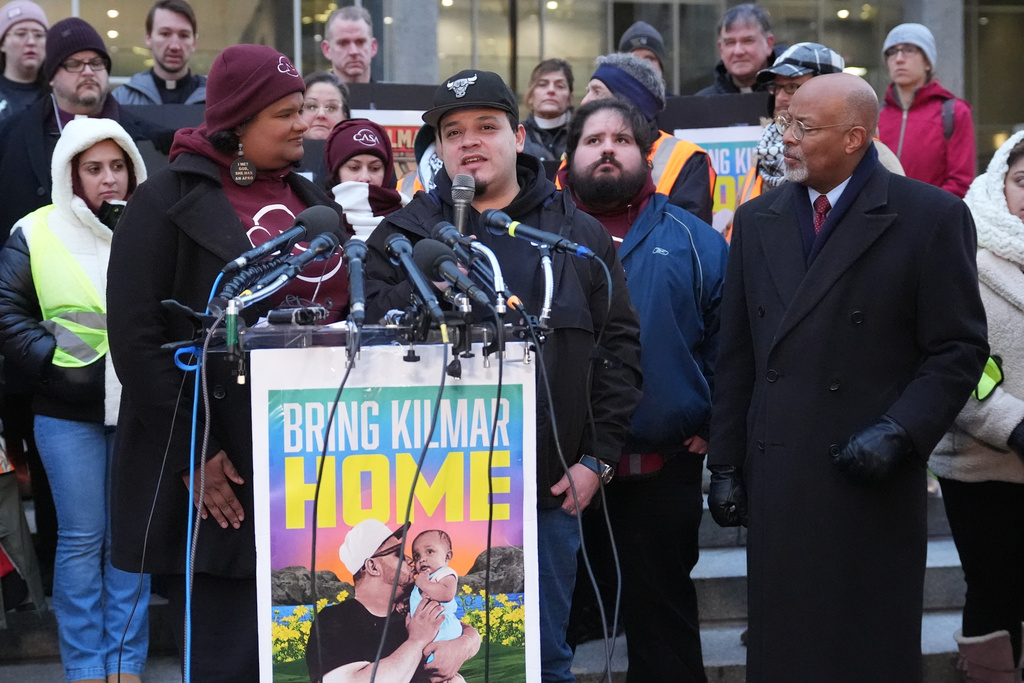 Kilmar Abrego Garcia speaks at a rally before a mandatory check at the Immigration and Customs Enforcement office in Baltimore, Friday, Dec. 12, 2025, after he was released from detention on Thursday under a judge's order. (AP Photo/Stephanie Scarbrough)