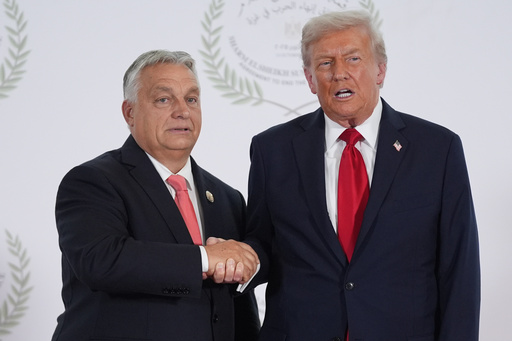 President Donald Trump greets Hungary's Prime Minister Viktor Orban during a summit to support ending the more than two-year Israel-Hamas war in Gaza after a breakthrough ceasefire deal, Monday, Oct. 13, 2025, in Sharm El Sheikh, Egypt. (AP Photo/Evan Vucci, Pool) President Donald Trump greets Hungary's Prime Minister Viktor Orban during a summit to support ending the more than two-year Israel-Hamas war in Gaza after a breakthrough ceasefire deal, Monday, Oct. 13, 2025, in Sharm El Sheikh, Egypt. (AP Photo/Evan Vucci, Pool)