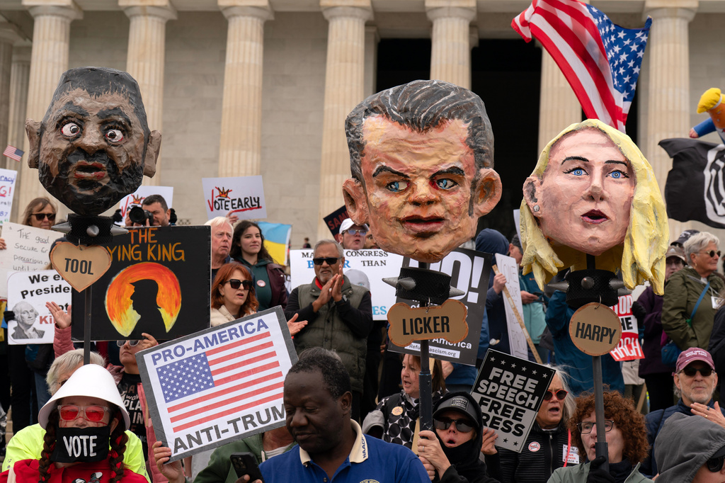 Demonstrators rally at the Lincoln Memorial during a "No Kings" protest in Washington, Saturday Oct. 17, 2026. (AP Photo/Jose Luis Magana)
