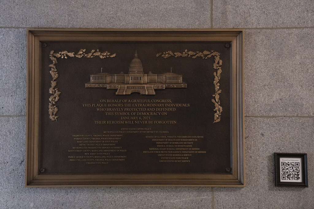 A plaque honoring police service on Jan. 6, 2021 at the Capitol, Saturday, March 7, 2026, in Washington. (AP Photo/Allison Robbert)