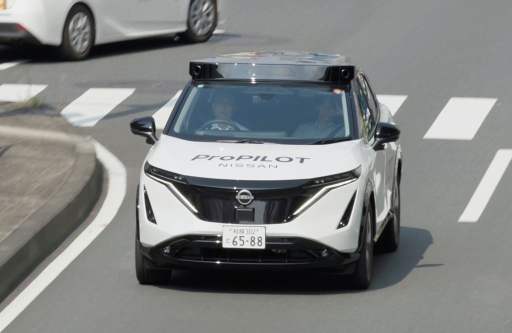 In this image made from video provided by Nissan Motor Co., Japanese automaker Nissan's test vehicle featuring an automated driving system packed with artificial intelligence moves on a road in Tokyo on September, 2025. (Nissan Motor Co. via AP)