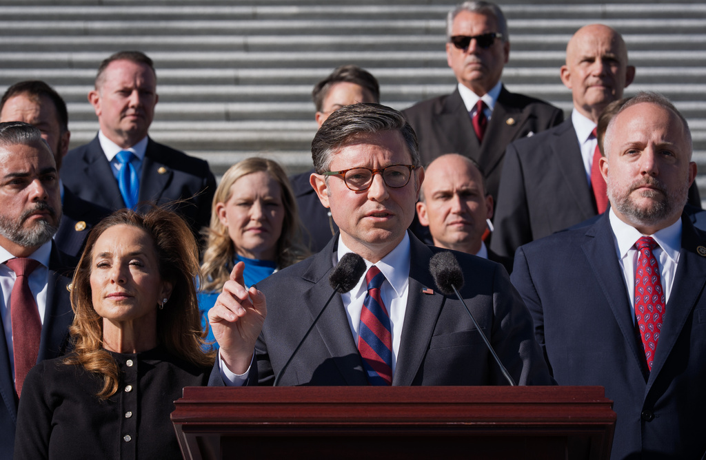 Speaker of the House Mike Johnson, R-La., and his fellow Republicans meet with reporters on the morning after Election Day, on the steps of the Capitol in Washington, Wednesday, Nov. 5, 2025, day 36 of the government shutdown. (AP Photo/J. Scott Applewhite)