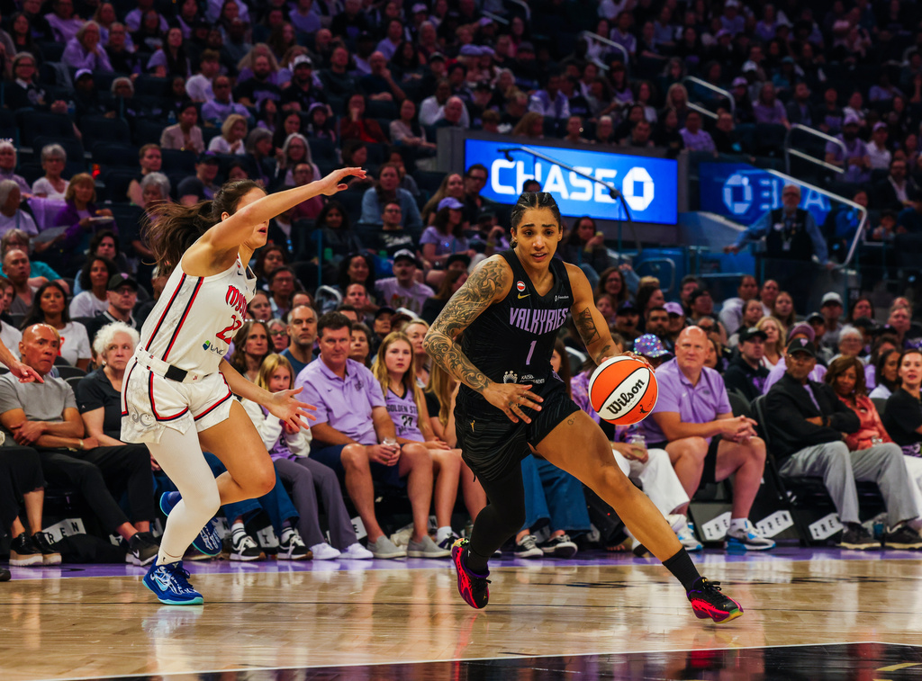 The Golden State Valkyries forward Gabby Williams (1) drives down the court against Washington Mystics guard Sonia Citron (22) in the first half of a WNBA basketball game in San Francisco on Saturday, July 18, 2026. (Yalonda M. James/San Francisco Chronicle via AP)